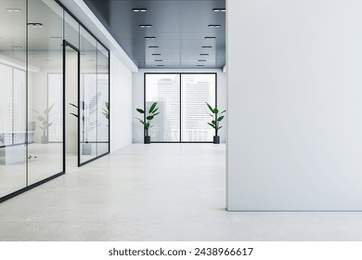 Modern glass office corridor interior with blank mock up place on wall, concrete flooring, window with city view and reflections. 3D Rendering