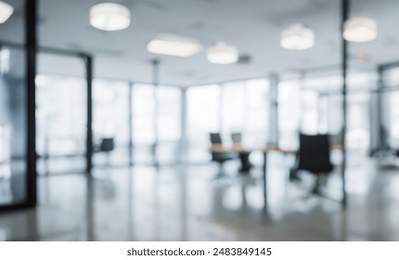 Abstract blurred image of modern Open space office with white interior concept full furniture for background design concept