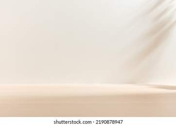Blank warm lighting background. White and Wooden surface. Light and Shadow wallpaper. Space for text. Backdrop. Studio photography.