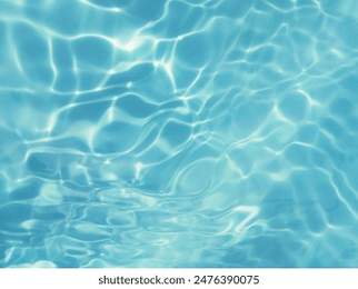 Blue water with ripples on the surface. Defocus blurred transparent blue colored clear calm water surface texture with splashes and bubbles. Water waves with shining pattern texture background.