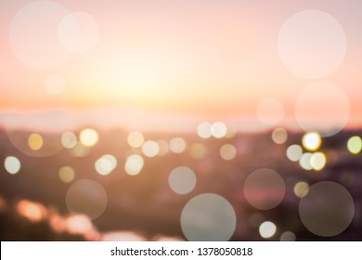 Blur Background city abstract with sunset and beautiful lighting bokeh motion focus in the morning