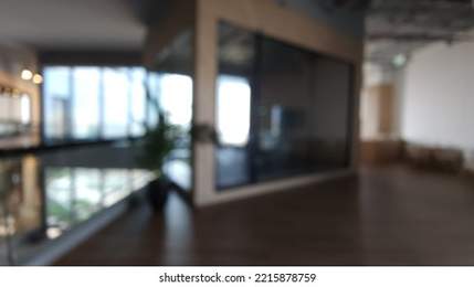Blur focus of Fashion and modern office interiors. Front view of a loft open space office interior. Blur background.